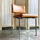 Chair in chromed metal and ochre skaï 1970s
