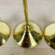 3 Scandinavian style gold-plated brass candle holders