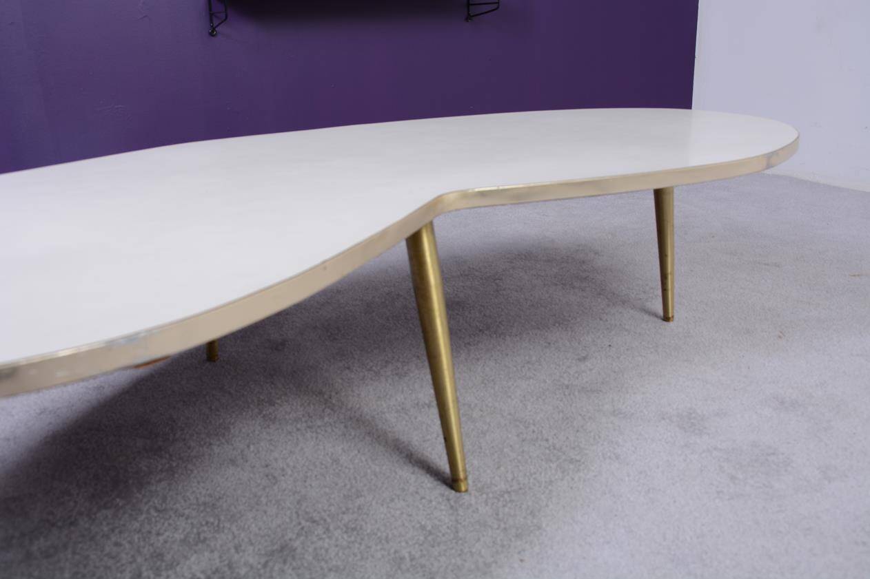 Free-form coffee table dating from the 60s,
