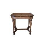Louis XVI style caned piano stool