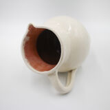 White pitcher in glazed stoneware