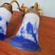 Pair of wall lights in bronze and marmoreal glass