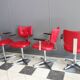 Quatre chaises de barbier en cuir rouge des années 1960 avec accoudoirs bakelite