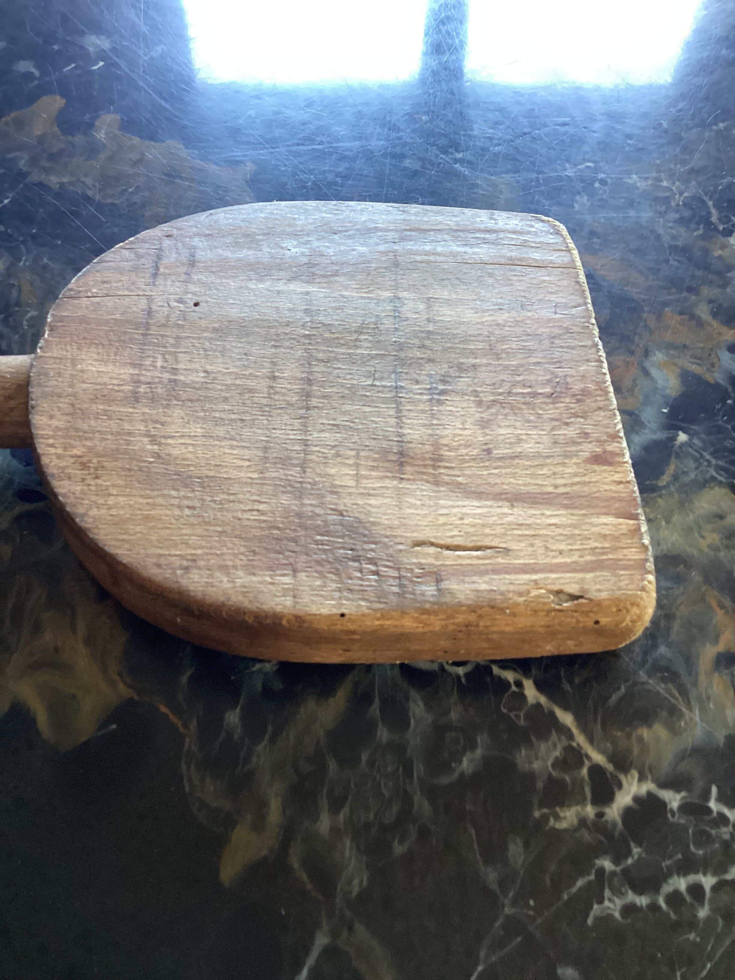 Old wooden clothes beater