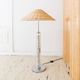 Richard Essig 1960s floor/table lamp with transparent glass body, chrome base, brown rattan shade