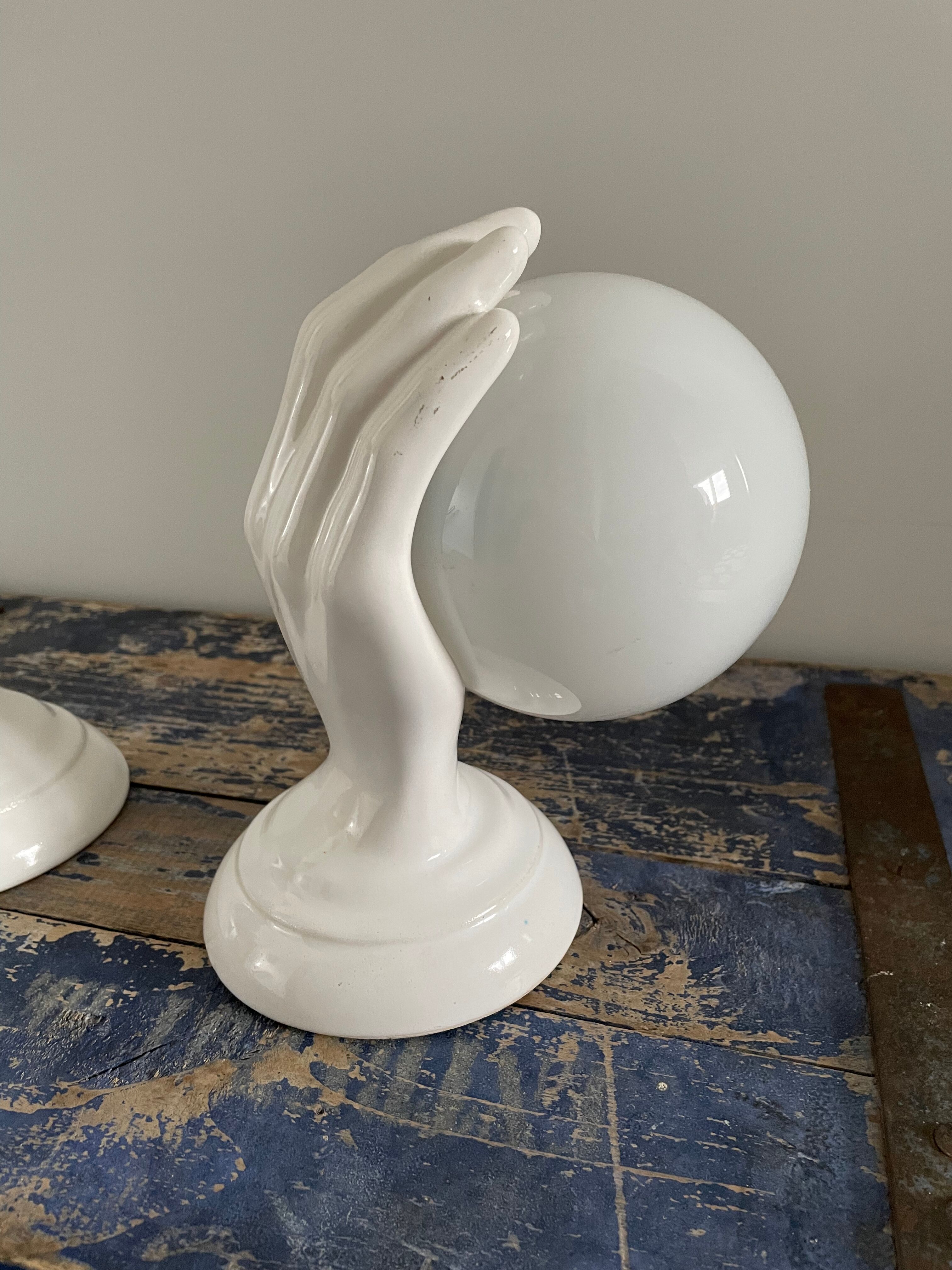 Set of two white ceramic hand sconces