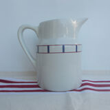Basque pitcher in sandstone