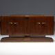 Art Deco walnut sideboard with brass details and sculptural base, France, 1930s
