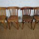 4 mismatched signed bistro chairs