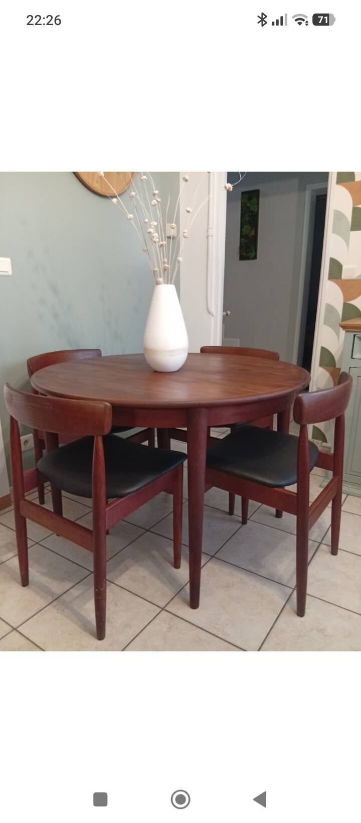 Four Danish mid-century teak armchairs.