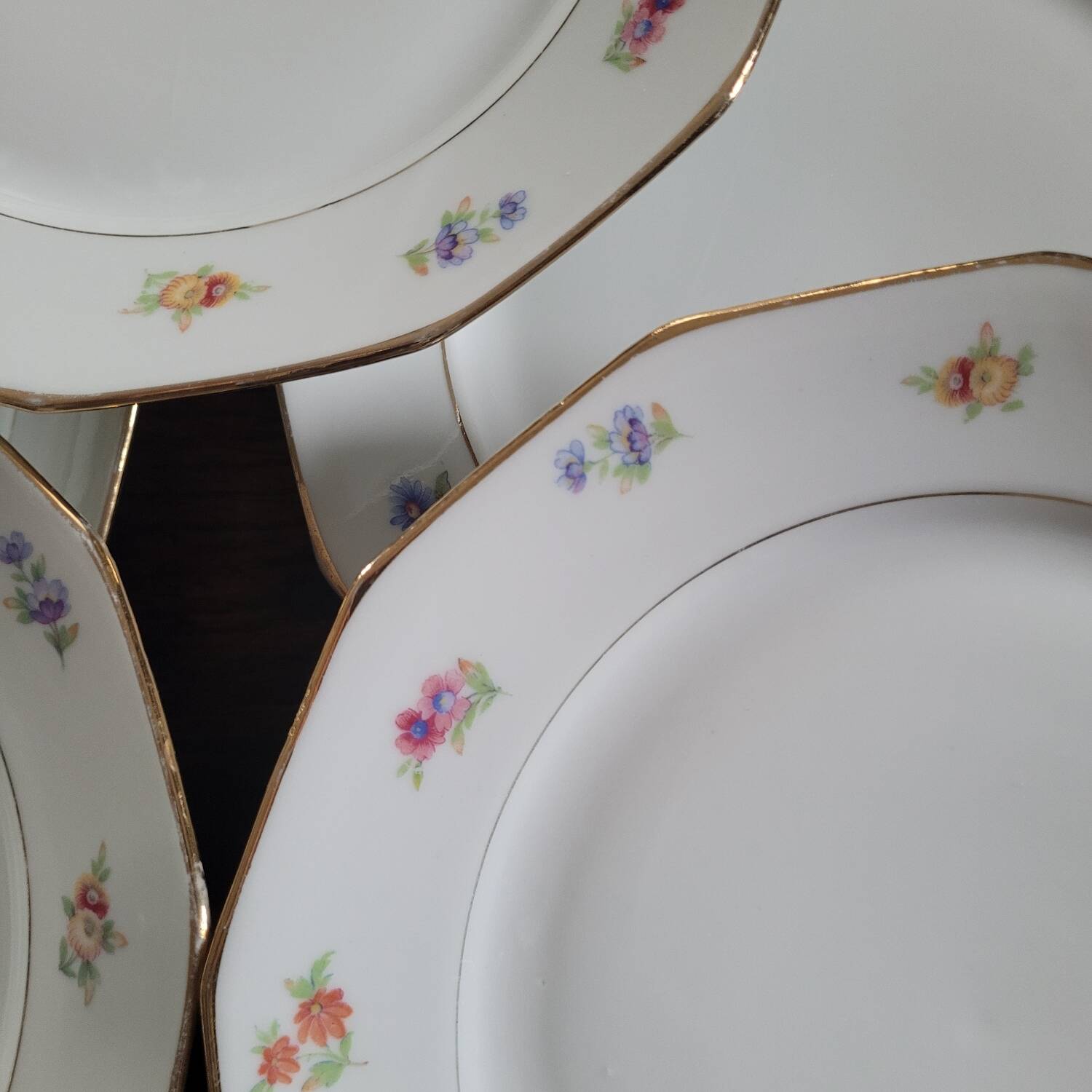 Set of 8 porcelain plates with twelve cut sides - floral decoration and