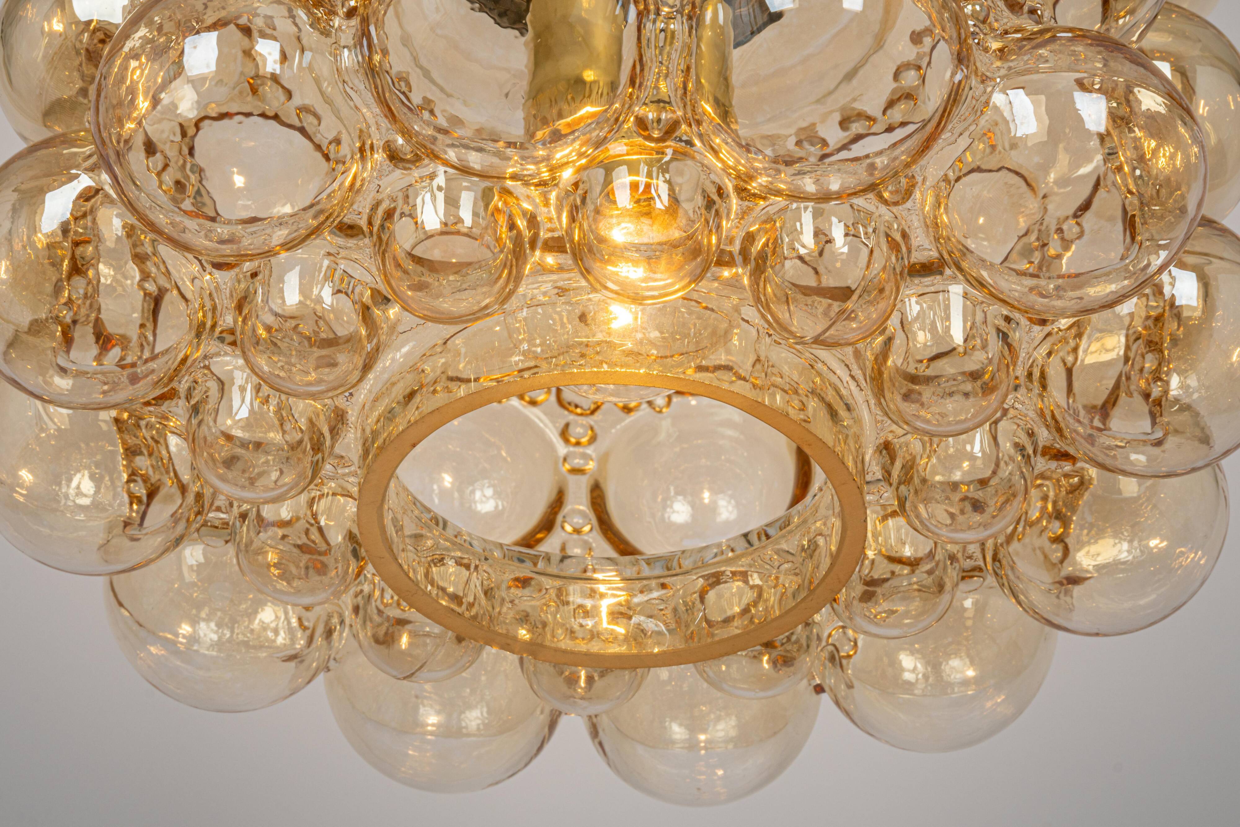 Large amber bubble glass pendant by Helena Tynell for Limburg, Germany, 1970s.