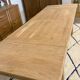 Solid oak extendable farmhouse table with 2 drawers.