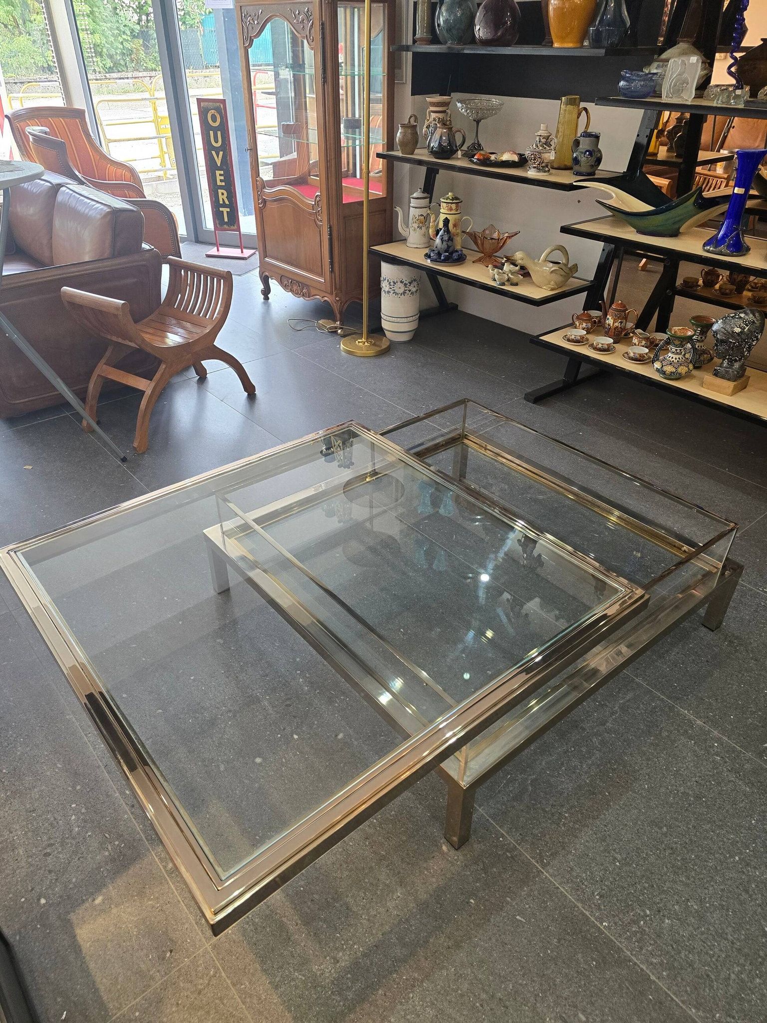 Sliding top coffee table – 70s design – chrome & glass – 108 cm