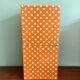 Vinyl storage cube - orange with white polka dots
