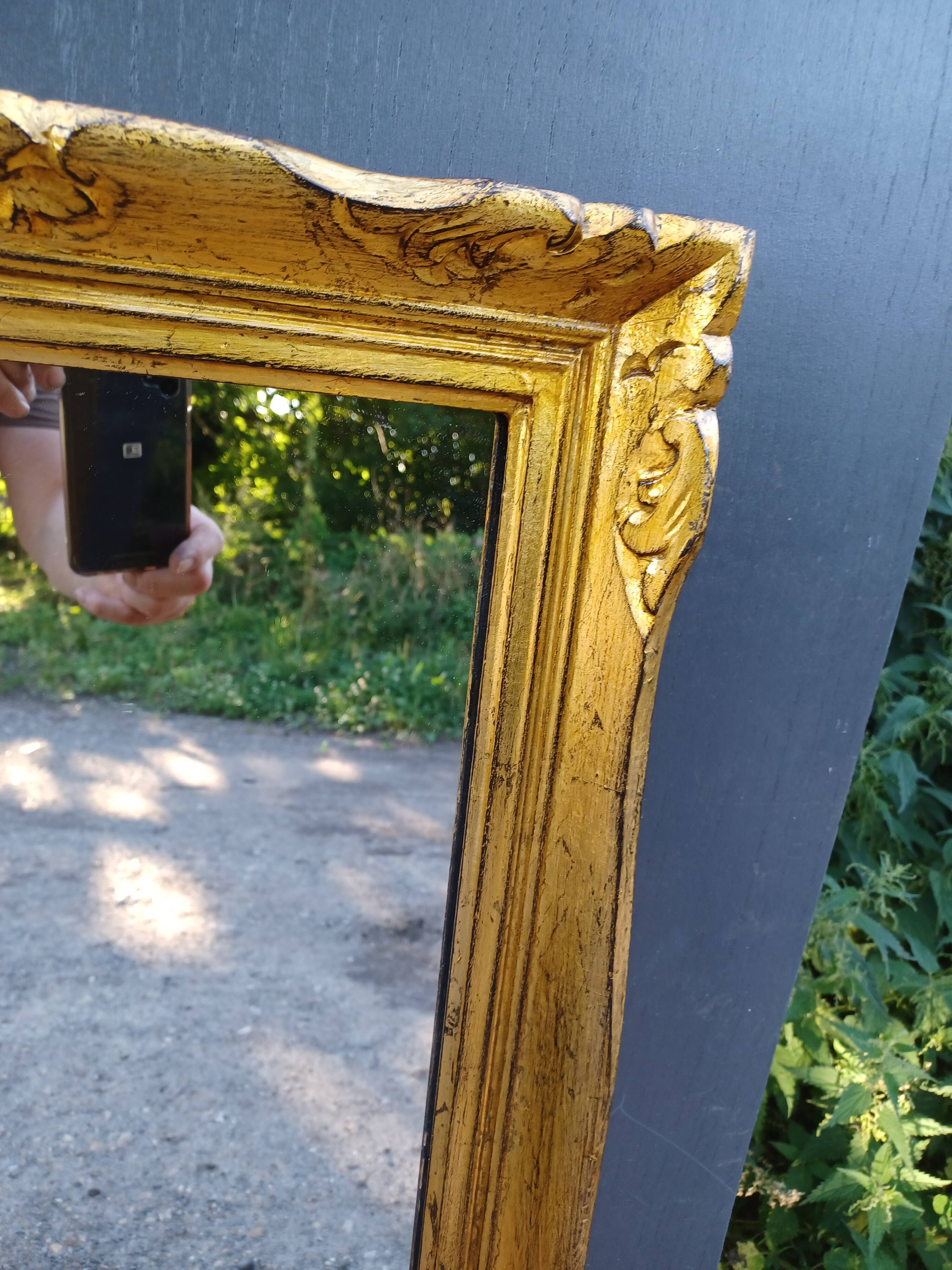 NARROW GOLDEN MIRROR IN LOUIS XV STYLE