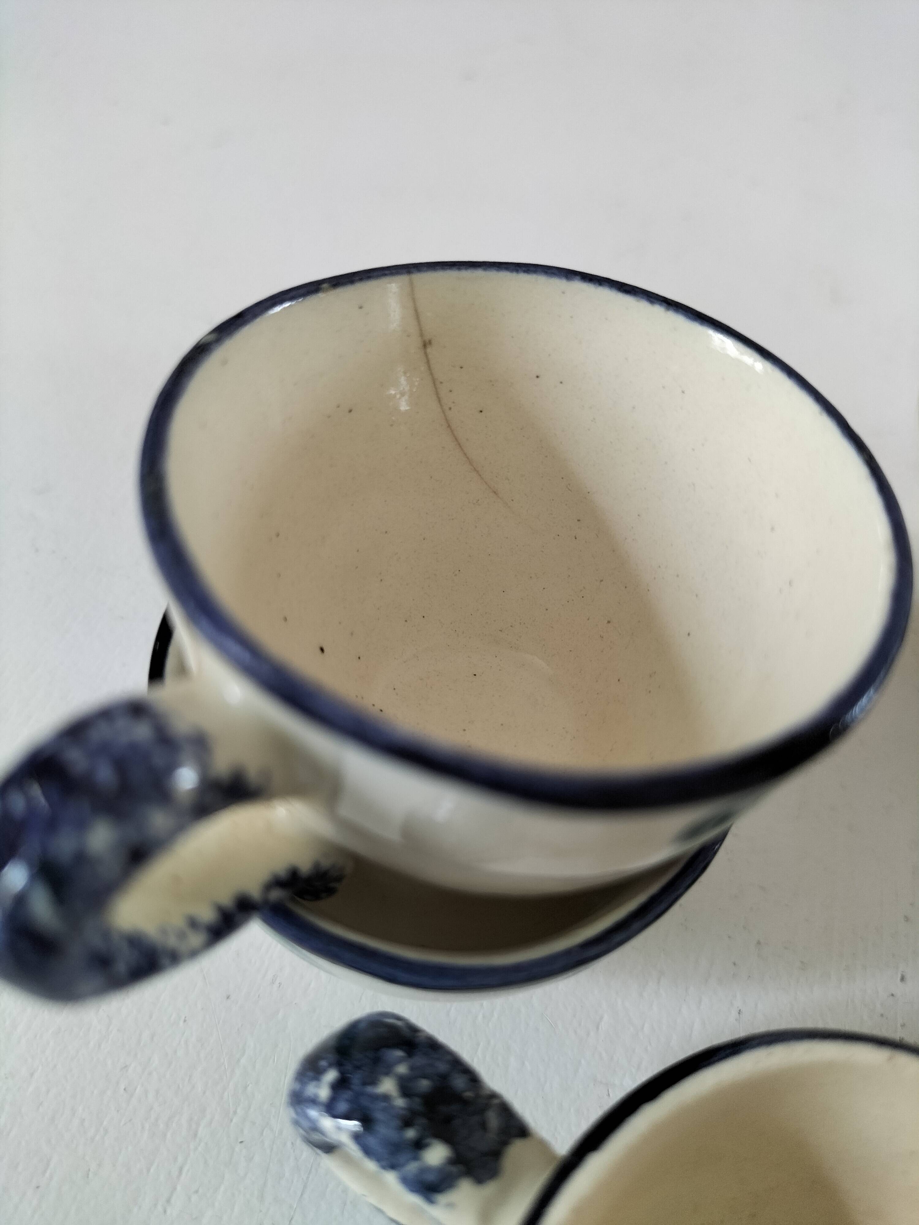 Set of 7 miniature Quimper earthenware cups