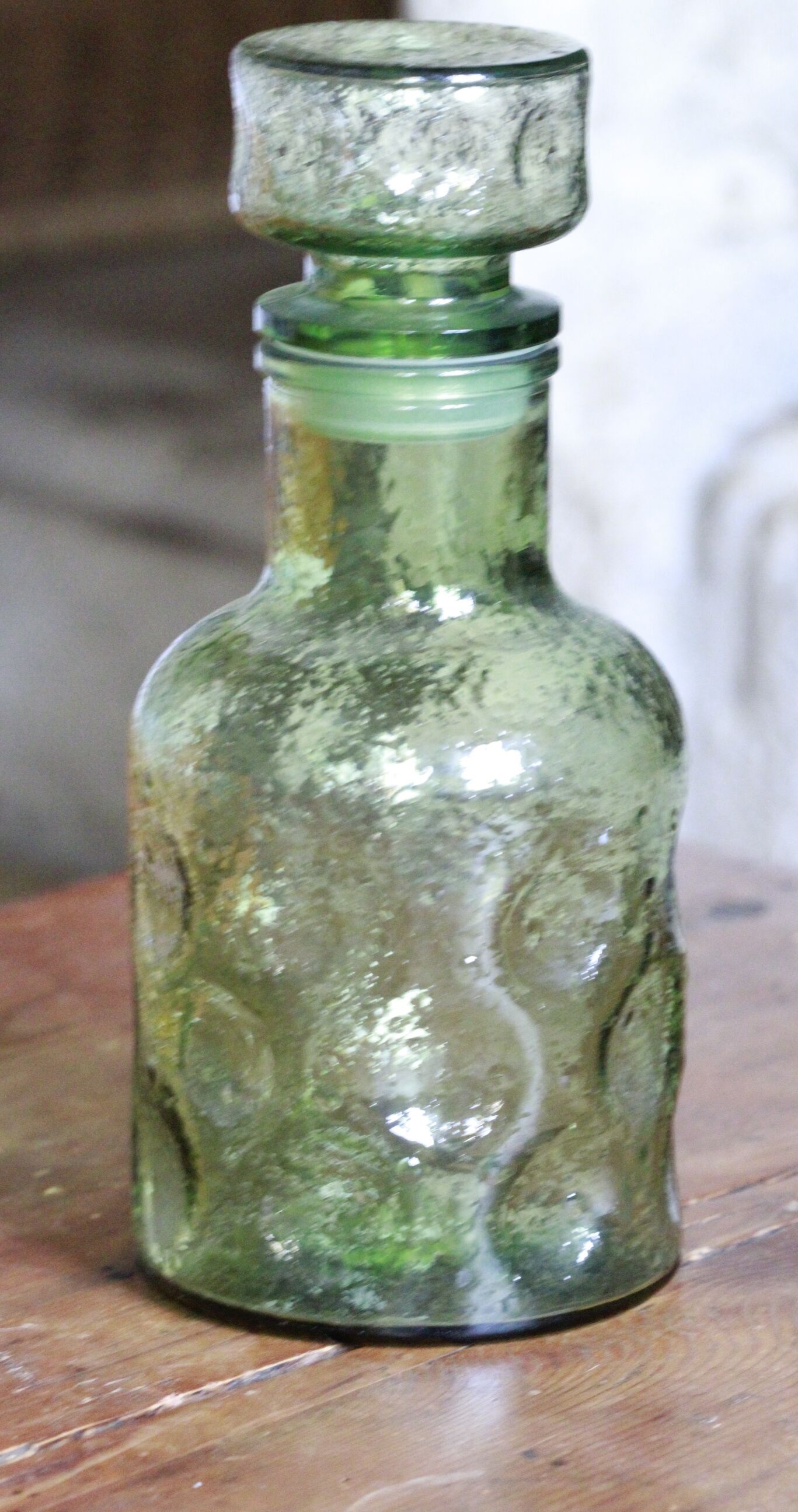 Green bottle made of old glass