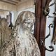 Garden statue of the Virgin Mary in old reconstituted stone