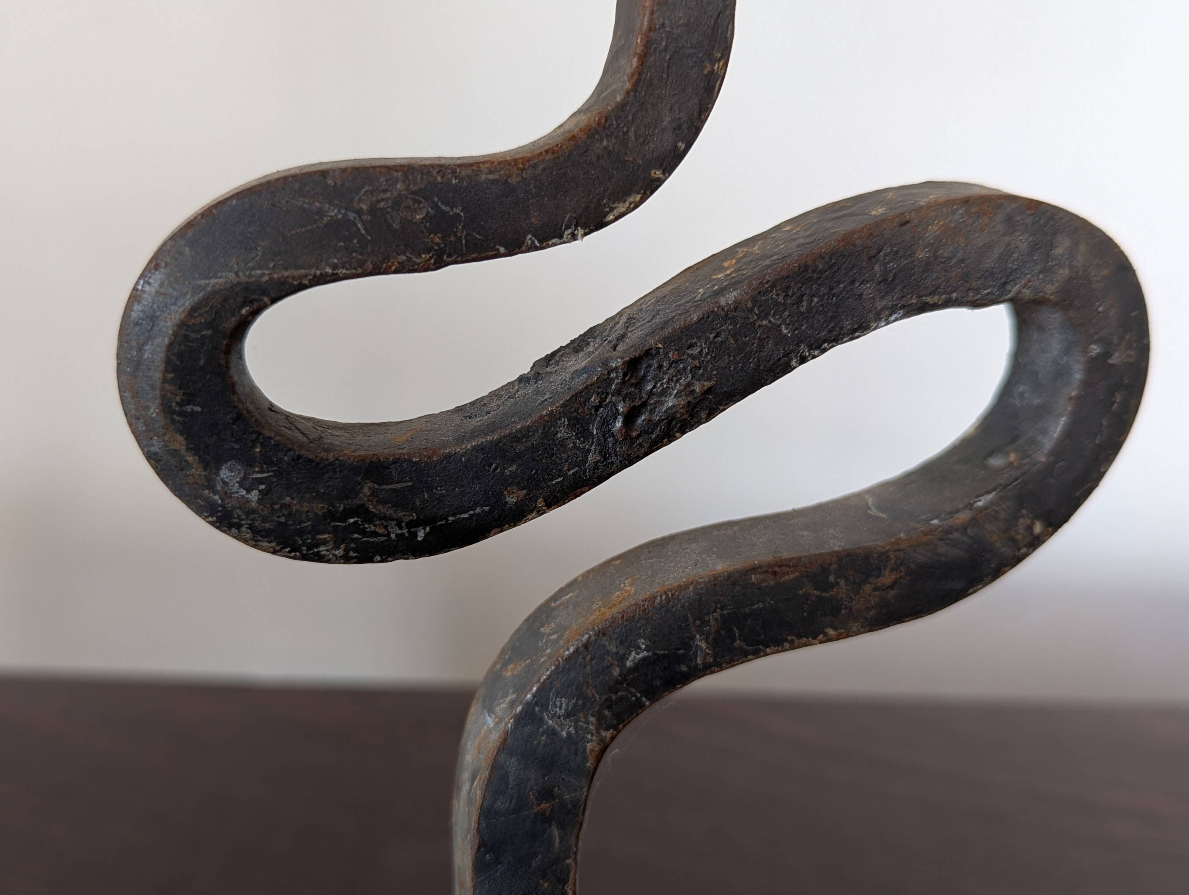 Pair of wrought iron candlesticks