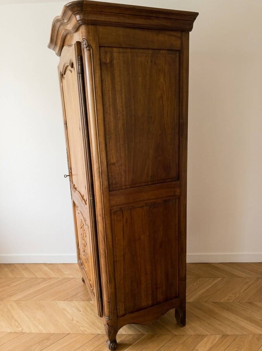 Antique wardrobe in classic style made of solid wood.