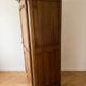 Antique wardrobe in classic style made of solid wood.