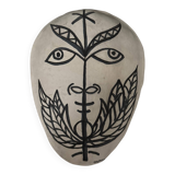 Africanist mask in glazed white terracotta, face signed Colette.