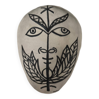 Africanist mask in glazed white terracotta, face signed Colette.