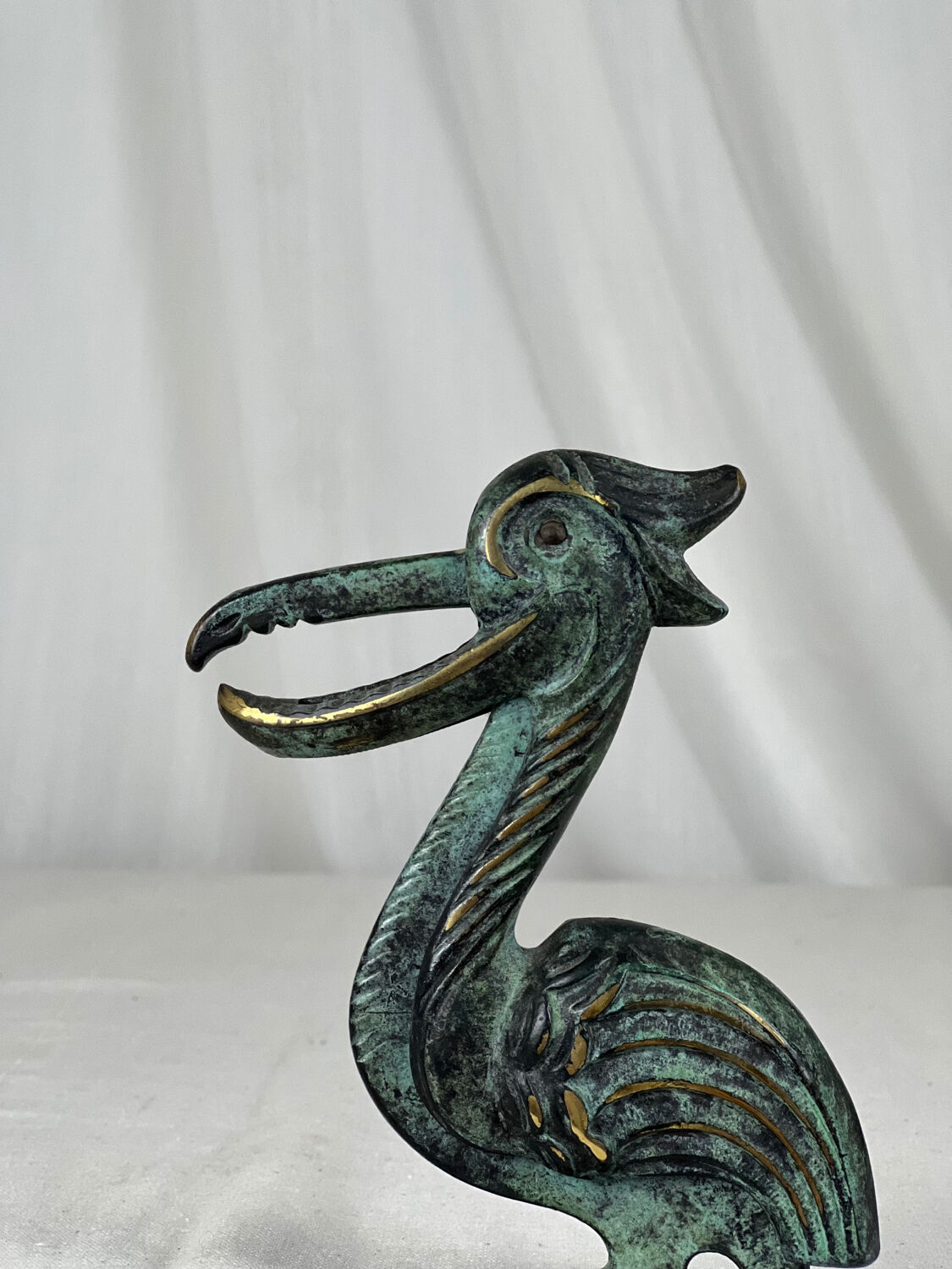 Brass pelican