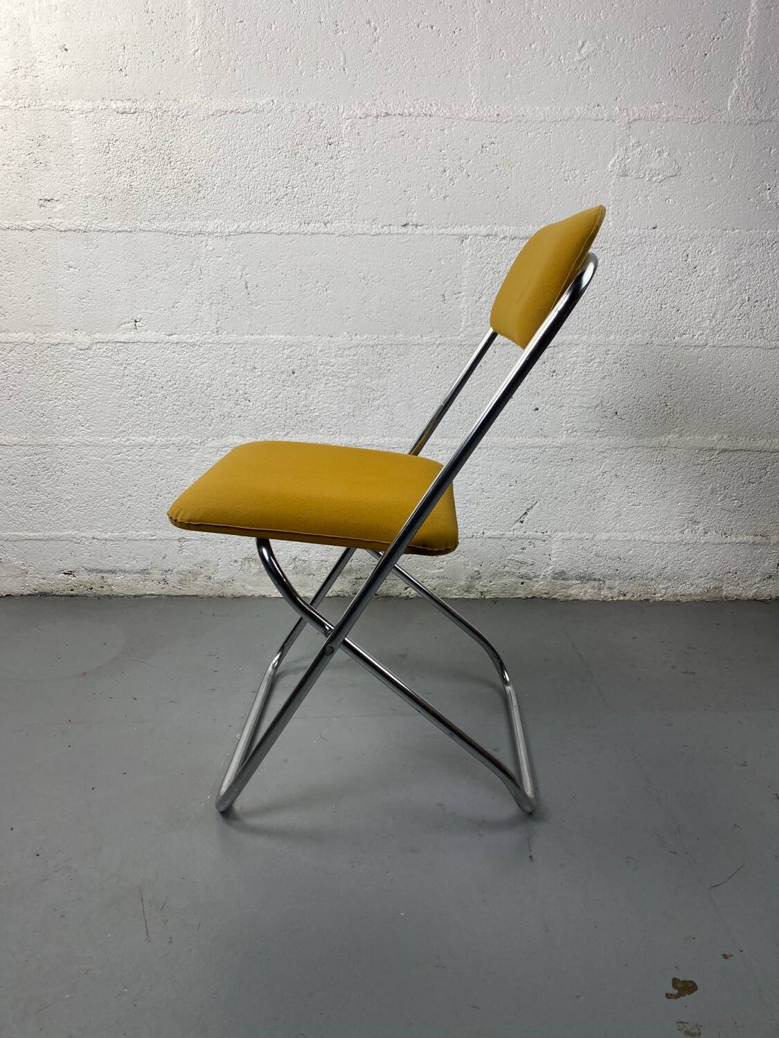 Mustard yellow folding chair