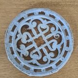 Dessous de plat en fonte