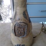 Sandstone lamp base with fleur-de-lis coat of arms