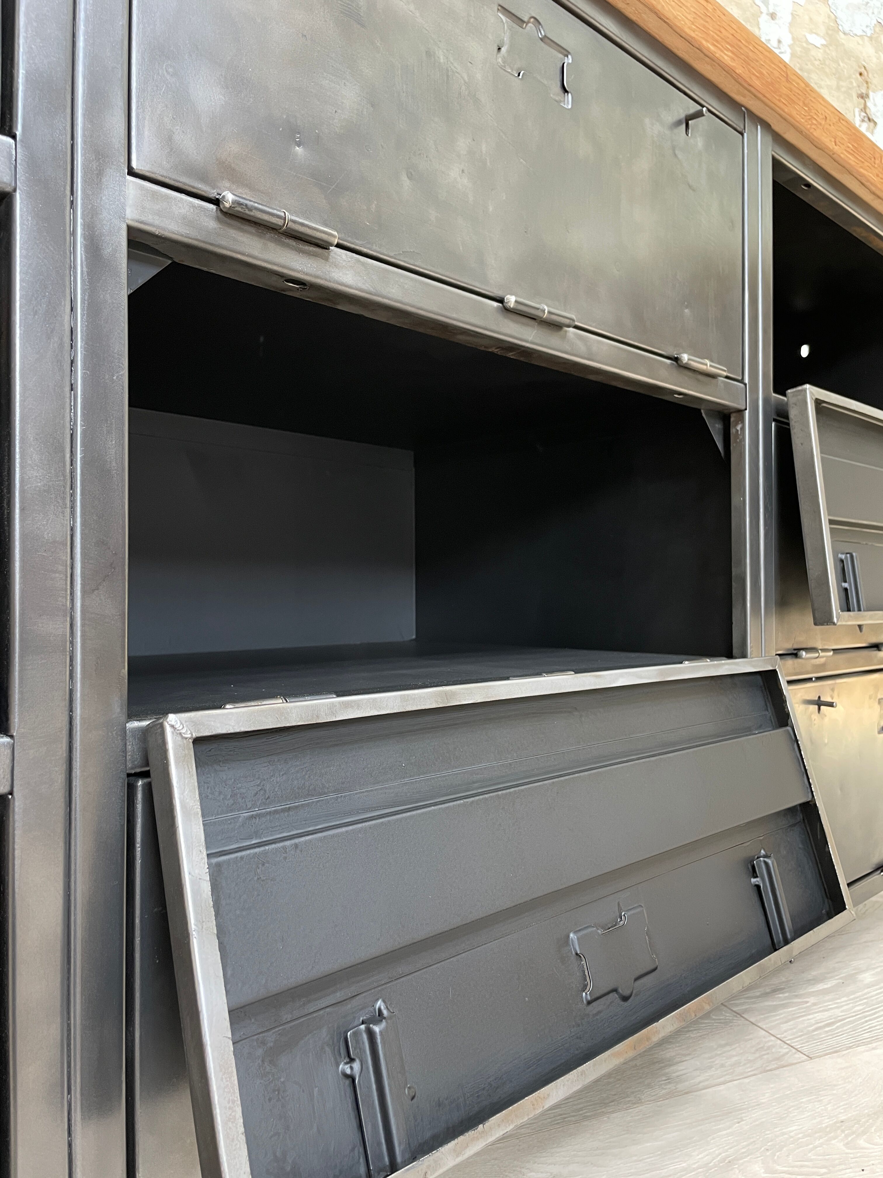 Industrial row in metal and oak.