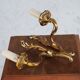 Pair of Louis XV style sconces in bronze with 1 arm of light