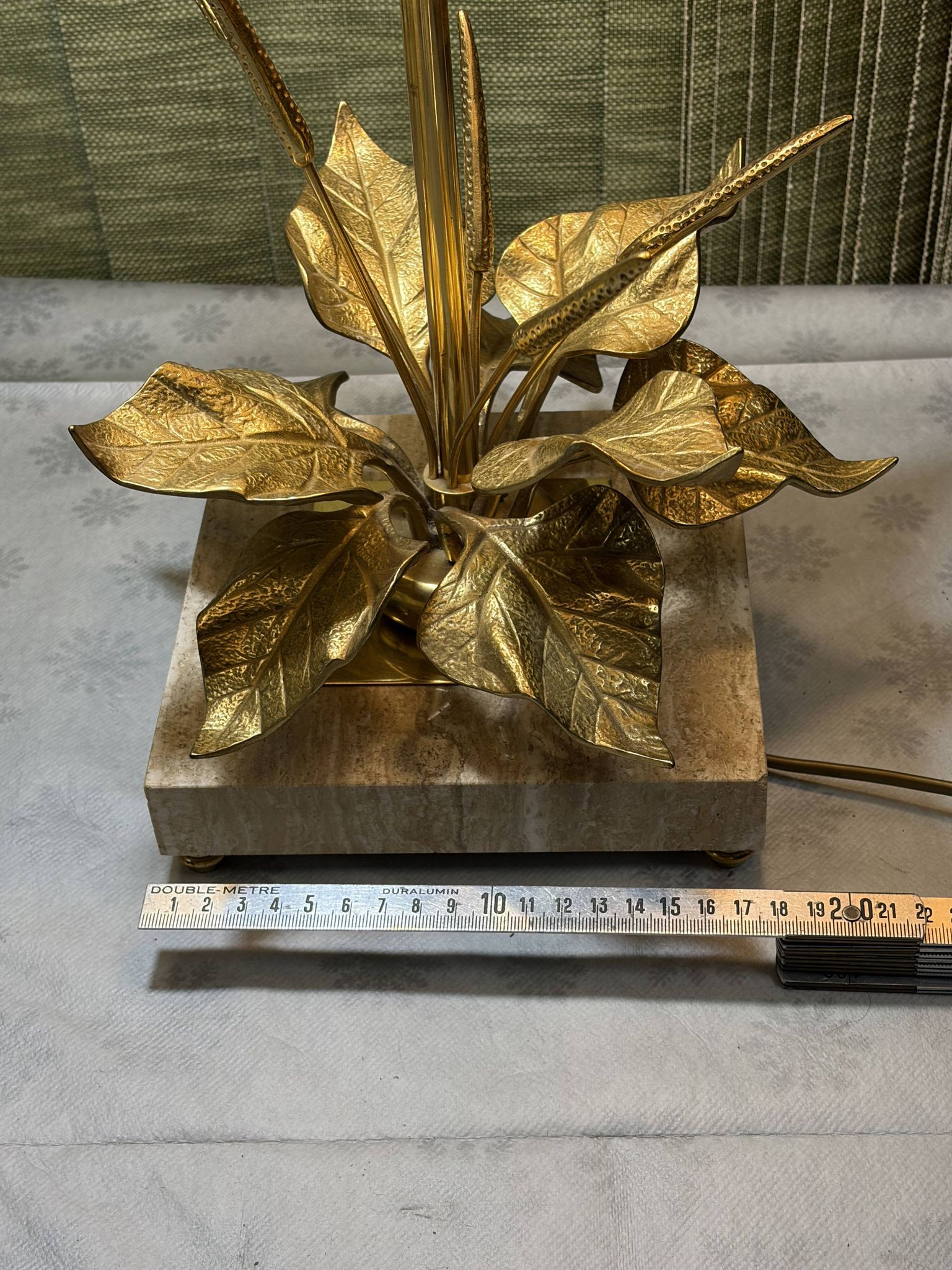 Bronze and travertine water lily lamp attributed to Maison Charles, circa 1970.
