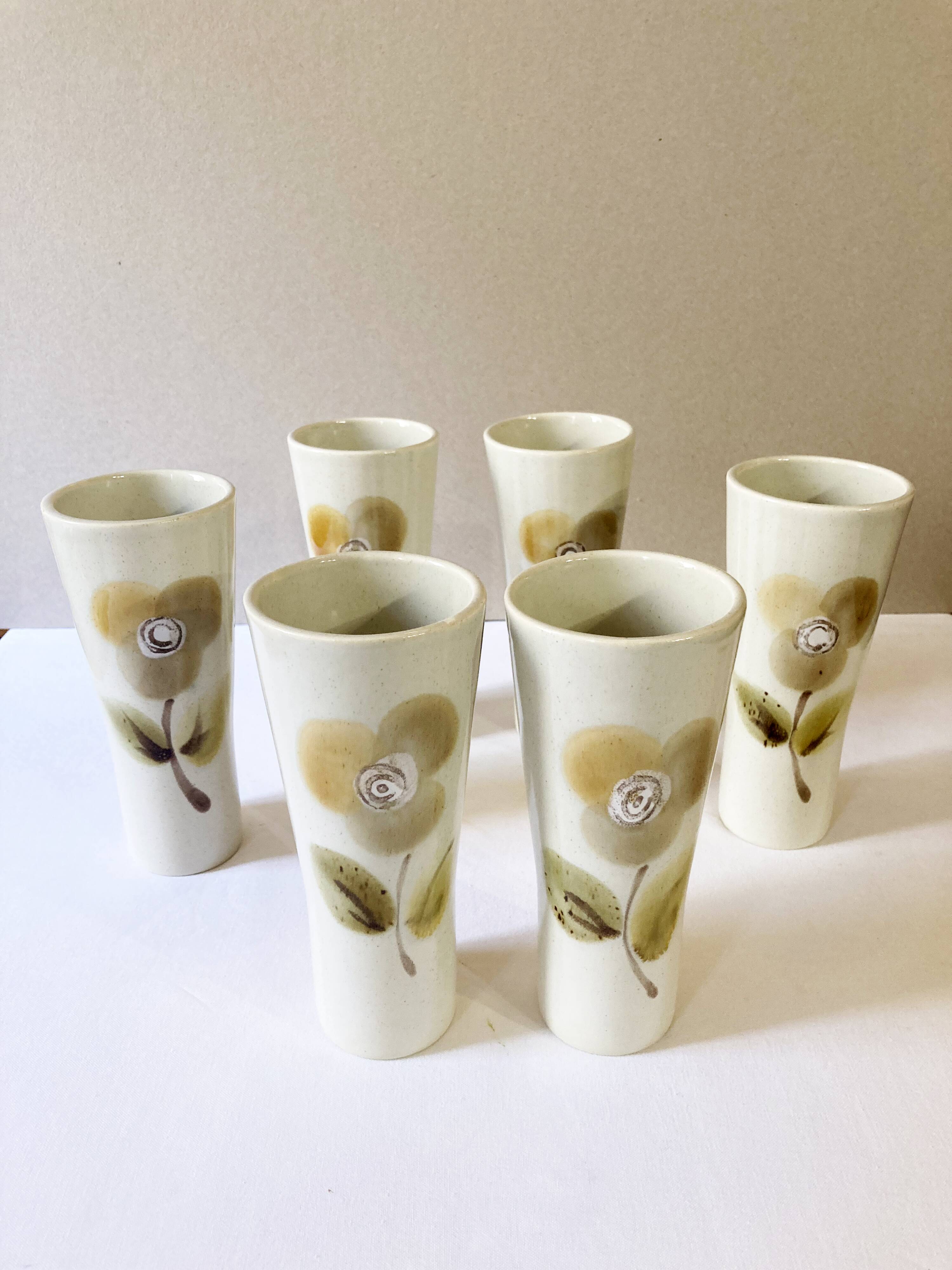 Large ceramic glasses, hand-painted flower pattern, beige/cream tones