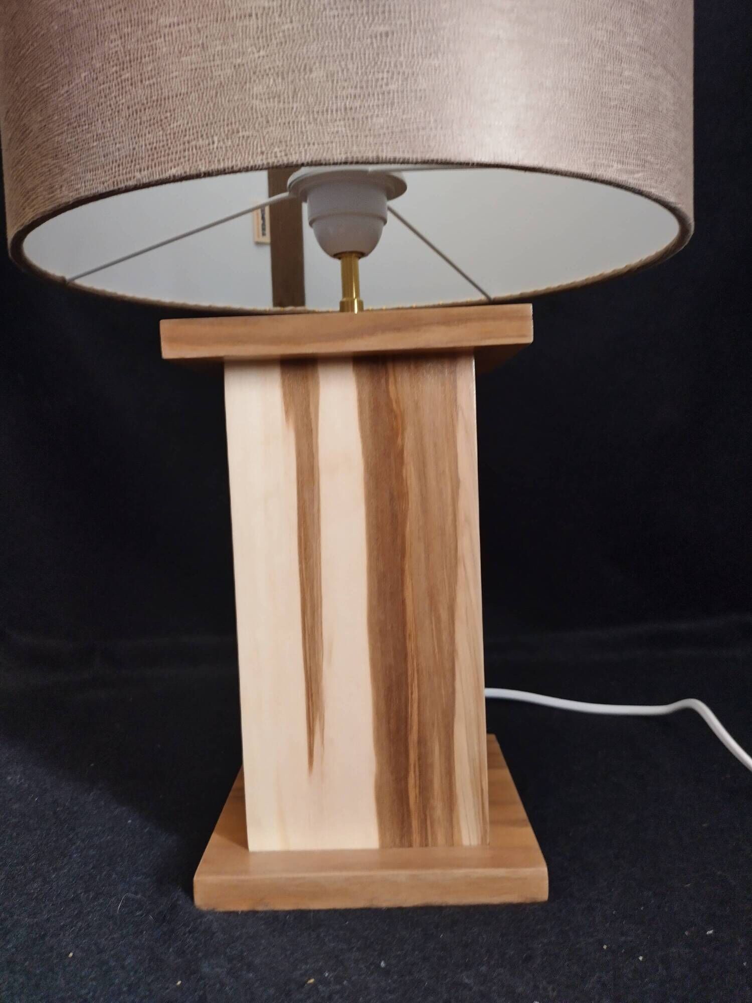 Handcrafted lamp in a contemporary style.