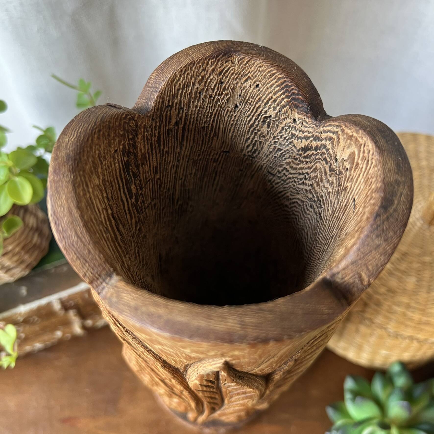Large sculpted vase made of solid wood