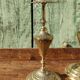 Pair of chiseled brass candle holders
