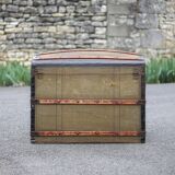 Antique trunk made of burlap and iron, storage suitcase