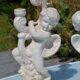 Pair of "cherub" candle holders in plaster