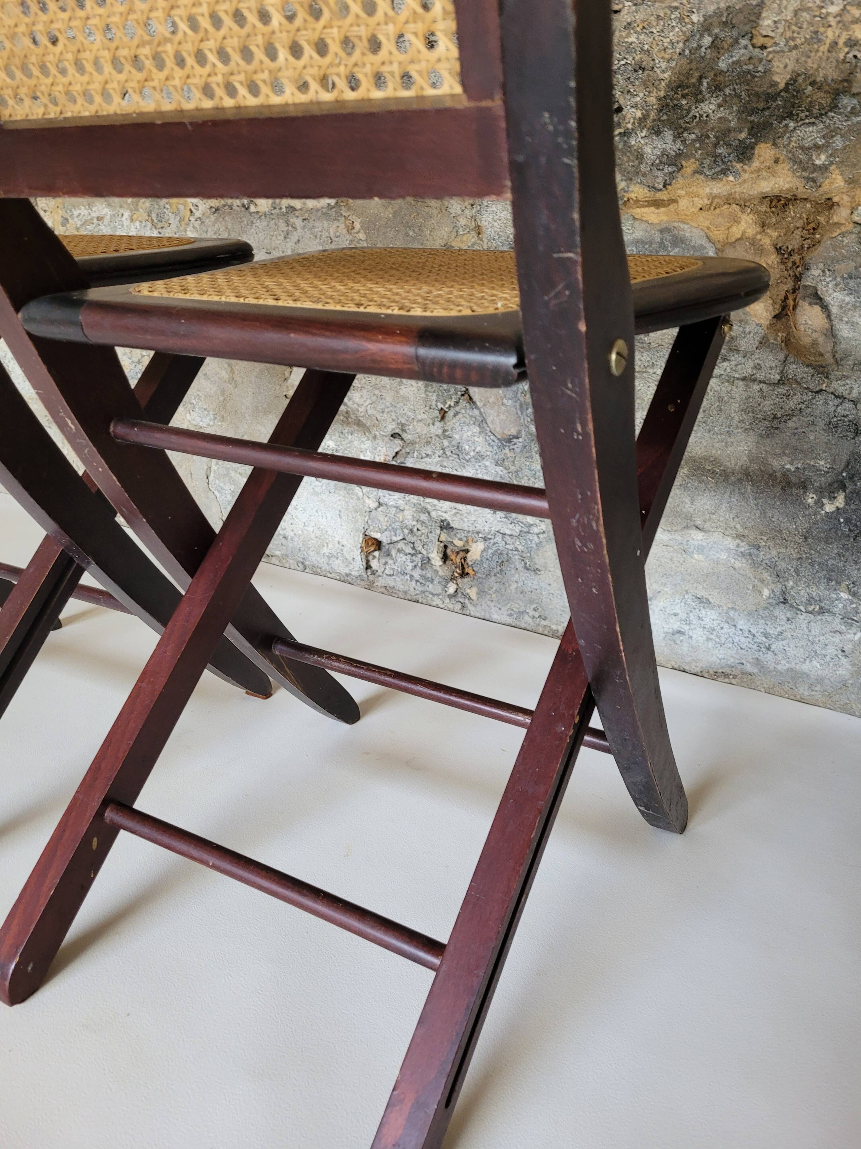 Pair of folding cane chairs