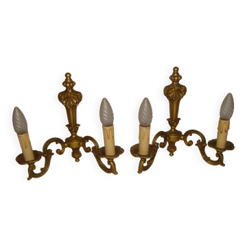 pair of bronze wall lights with 2 arms