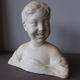Bust of the laughing child