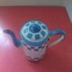 White enamelled sheet metal coffee maker with blue checkered Lustucru style stamped Duco