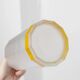 Vintage milky glass vase with yellow base, twelve-faced silhouette, Italian Bormioli, 1980s