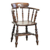Wooden English antique pub/captain chair from the late 19th century