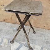 Old industrial folding steel stool
