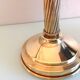 Pair of empire style brass candlesticks
