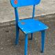 Child's chair in vintage or rustic wood style from the 1960s.